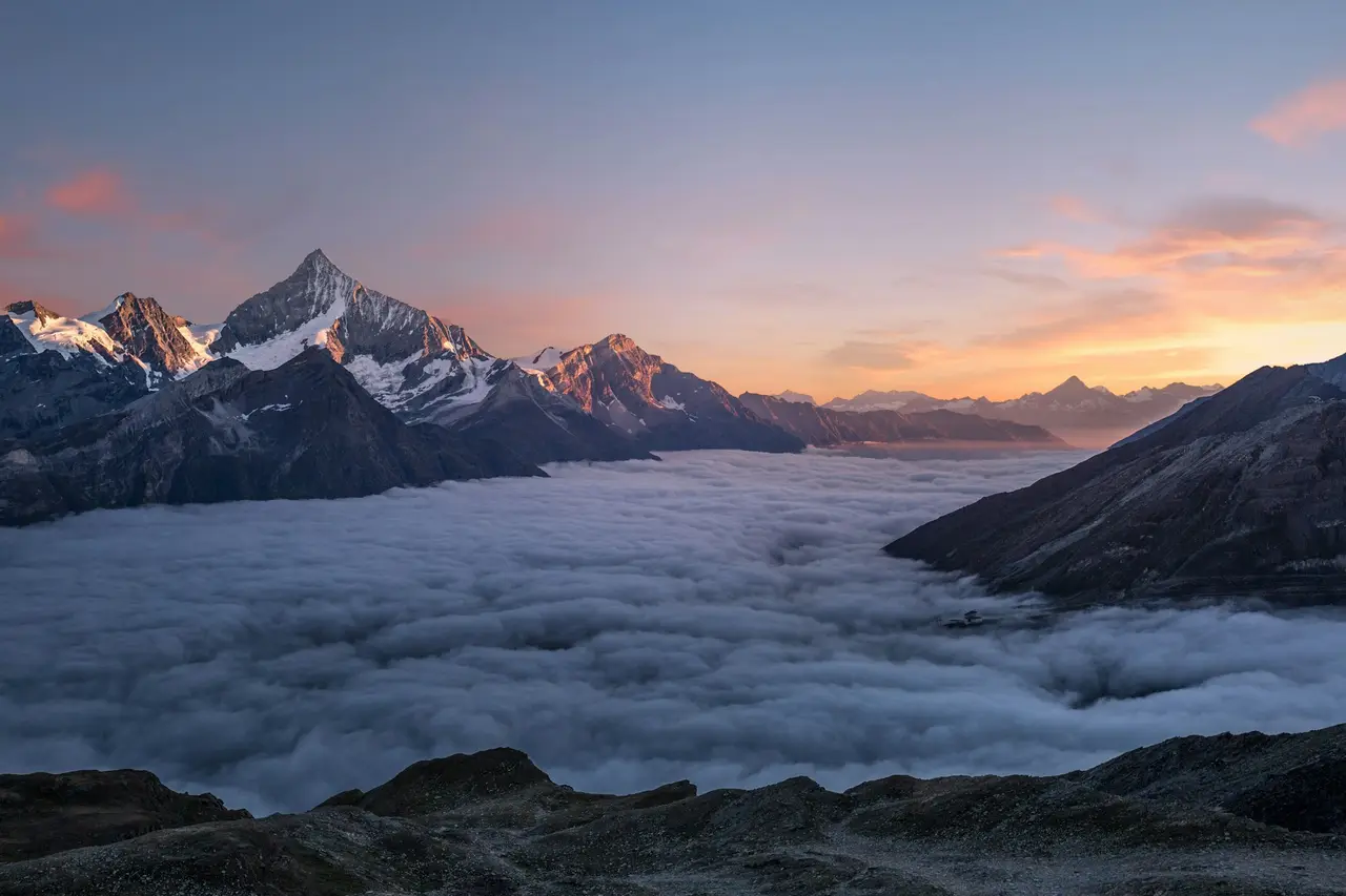 Aerial view of foggy mountain peaks